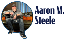 Aaron M. Steele